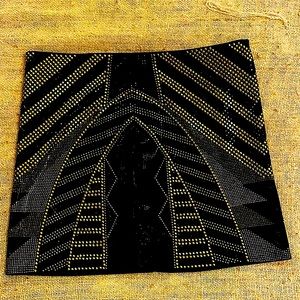 Black and gold mini skirt